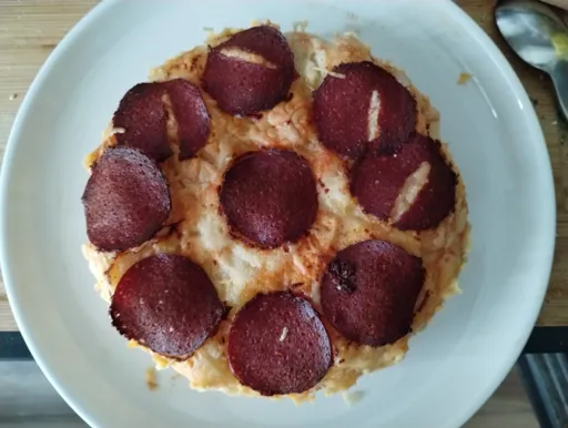 Shwarma Salami Pizza Pie with a slice cut out